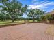 Brick driveway leading to the house with views of the lawn and golf course at 4033 Priory Cir, Tampa, FL 33618