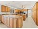 Spacious kitchen featuring an island and lots of cabinet space at 4033 Priory Cir, Tampa, FL 33618