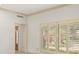 Bright living room with windows, shutters and simple trim at 4033 Priory Cir, Tampa, FL 33618