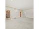 Empty living room with access to back patio and kitchen at 4033 Priory Cir, Tampa, FL 33618