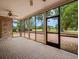 Enclosed brick patio with expansive views of the golf course at 4033 Priory Cir, Tampa, FL 33618