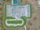 Aerial view of the community skate park showcasing ramps, rails, and smooth surfaces for skaters at 4033 Priory Cir, Tampa, FL 33618