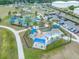 Overhead shot of community splash pad featuring shaded seating, interactive water features, and playful design at 4033 Priory Cir, Tampa, FL 33618