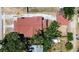 Aerial view of the home, showcasing its well-maintained roof and lush surrounding landscape at 4519 5Th S Ave, St Petersburg, FL 33711