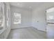 Bright bedroom featuring recessed lighting, large windows, and an open doorway at 4519 5Th S Ave, St Petersburg, FL 33711