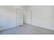 Bedroom with two doors featuring modern gray tile flooring at 4519 5Th S Ave, St Petersburg, FL 33711