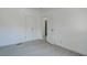 Bedroom with two doors featuring modern gray tile flooring at 4519 5Th S Ave, St Petersburg, FL 33711