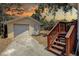 Exterior view of garage with a drive and wooden steps at 4519 5Th S Ave, St Petersburg, FL 33711