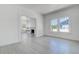 Bright living room featuring windows, white trim, and tile flooring for a modern, airy feel at 4519 5Th S Ave, St Petersburg, FL 33711