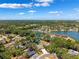 Community aerial showcasing its location near a scenic lake and surrounding community amenities at 505 S Larry Cir, Brandon, FL 33511