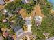 Overhead aerial view of the property nestled among trees, highlighting its well-maintained yard and neighborhood at 505 S Larry Cir, Brandon, FL 33511