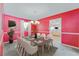 Inviting dining room featuring a modern chandelier, stylish decor, and bright, colorful walls at 505 S Larry Cir, Brandon, FL 33511