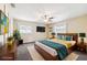 Stylish main bedroom with a modern bed, ceiling fan, and plenty of natural light at 505 S Larry Cir, Brandon, FL 33511