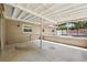 Covered patio features concrete flooring, neutral paint, and plenty of natural light, great for outdoor living and entertaining at 505 S Larry Cir, Brandon, FL 33511