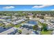 Beautiful aerial view of the community showcasing ponds, landscaping, and nearby amenities at 5316 Ladywell Ct, Tampa, FL 33624