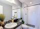 Well-lit bathroom features subway tile in the shower and a black granite countertop with decorative sea accessories at 5316 Ladywell Ct, Tampa, FL 33624