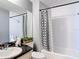 Updated bathroom featuring shower with a black and white shower curtain at 5316 Ladywell Ct, Tampa, FL 33624