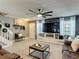 Inviting living room with modern decor, large TV, comfortable seating, and ample space for relaxation at 5316 Ladywell Ct, Tampa, FL 33624