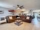 Open living area with stylish seating, elegant decor, and seamless flow to the dining area for easy entertaining at 5316 Ladywell Ct, Tampa, FL 33624