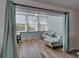 Cozy office space with hardwood floors, large windows, and a comfortable seating area at 5555 Gulf Blvd # 204, St Pete Beach, FL 33706