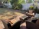 Relaxing backyard patio featuring comfortable wicker seating, perfect for outdoor entertaining at 5725 2Nd N Ave, St Petersburg, FL 33710