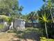 Private backyard with a storage shed, providing ample space for outdoor activities and relaxation at 5725 2Nd N Ave, St Petersburg, FL 33710