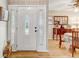 Elegant front door with decorative glass and sidelights creating a grand entrance to the home at 614 Sandalwood Dr, Plant City, FL 33563