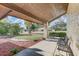 Covered front porch area, perfect for enjoying the outdoors and the landscaped yard at 614 Sandalwood Dr, Plant City, FL 33563