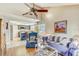 Comfortable living room featuring a view of the kitchen and casual dining area at 614 Sandalwood Dr, Plant City, FL 33563