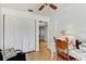 Office featuring a desk, chair, and a closet with a door leading into the house at 614 Sandalwood Dr, Plant City, FL 33563