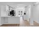 Bright, updated kitchen with modern appliances and stylish white and blue cabinetry at 621 85Th N Ave, St Petersburg, FL 33702