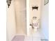 Bathroom showcasing a tiled walk-in shower, toilet, and accessories at 63 Forest Wood Ct, Spring Hill, FL 34609