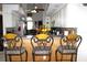 Kitchen with breakfast bar, stainless appliances, and view into living area at 63 Forest Wood Ct, Spring Hill, FL 34609