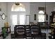 An interior view of the living room highlighting furniture, decor, and natural light at 63 Forest Wood Ct, Spring Hill, FL 34609