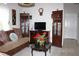 Cozy living room featuring comfortable sofa, cabinets, and stylish decor accents at 63 Forest Wood Ct, Spring Hill, FL 34609