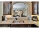 Kitchen sink features granite countertops and opens to the living room at 6918 Frog Pocket Pl, Tampa, FL 33616