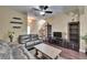 Relaxing living room showcasing modern furnishings, neutral paint, hardwood floors, and stylish decor at 6918 Frog Pocket Pl, Tampa, FL 33616