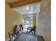 Private enclosed patio area featuring brick pavers and ample seating at 6918 Frog Pocket Pl, Tampa, FL 33616
