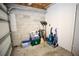 Unfinished garage space with block walls used for extra storage at 7229 Northbridge Blvd, Tampa, FL 33615