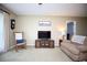 Comfortable living room featuring carpet and traditional furnishings at 7229 Northbridge Blvd, Tampa, FL 33615