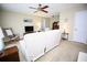 Comfortable living room with carpet, television, and traditional furnishings at 7229 Northbridge Blvd, Tampa, FL 33615