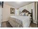 Comfortable bedroom featuring soft carpet, a window, and closet at 7603 N 53Rd St, Tampa, FL 33617