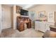Neutral bedroom with a desk and TV and lots of natural light at 7603 N 53Rd St, Tampa, FL 33617