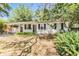 Cozy single-story house with carport and well-maintained landscaping adds to its appeal at 7603 N 53Rd St, Tampa, FL 33617