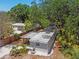 Birds-eye view of the well maintained single-Gathering home with a metal roof and fenced yard at 850 Center Ave, Brandon, FL 33511