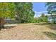 A spacious, empty, fenced backyard offering opportunities for landscaping and recreation at 850 Center Ave, Brandon, FL 33511