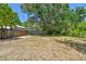 Spacious fenced backyard provides a private outdoor area, perfect for relaxation, recreation, and enjoying nature at 850 Center Ave, Brandon, FL 33511