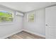 Bright bedroom with wood-look flooring and an energy-efficient mini split system at 850 Center Ave, Brandon, FL 33511