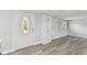Bright entryway with decorative front door, new flooring, and convenient storage at 850 Center Ave, Brandon, FL 33511