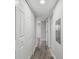 Hallway with closet space and modern flooring at 850 Center Ave, Brandon, FL 33511